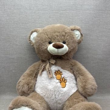 Imagen del producto OSO BEIGE CON HUELLAS 75 CM