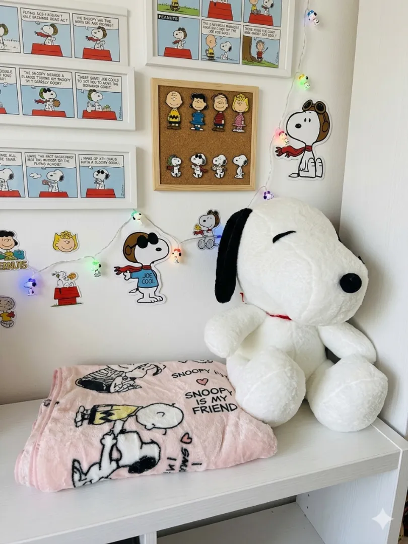 Peluche con cobija snoopy gafas 
