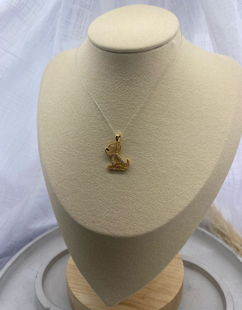 Dije, perrito, oro laminado 