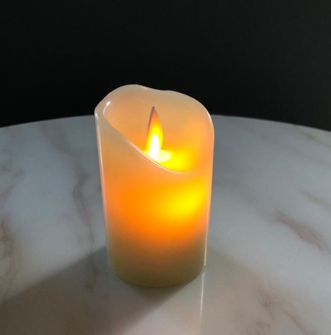 Vela Decorativa de Pilas en parafina