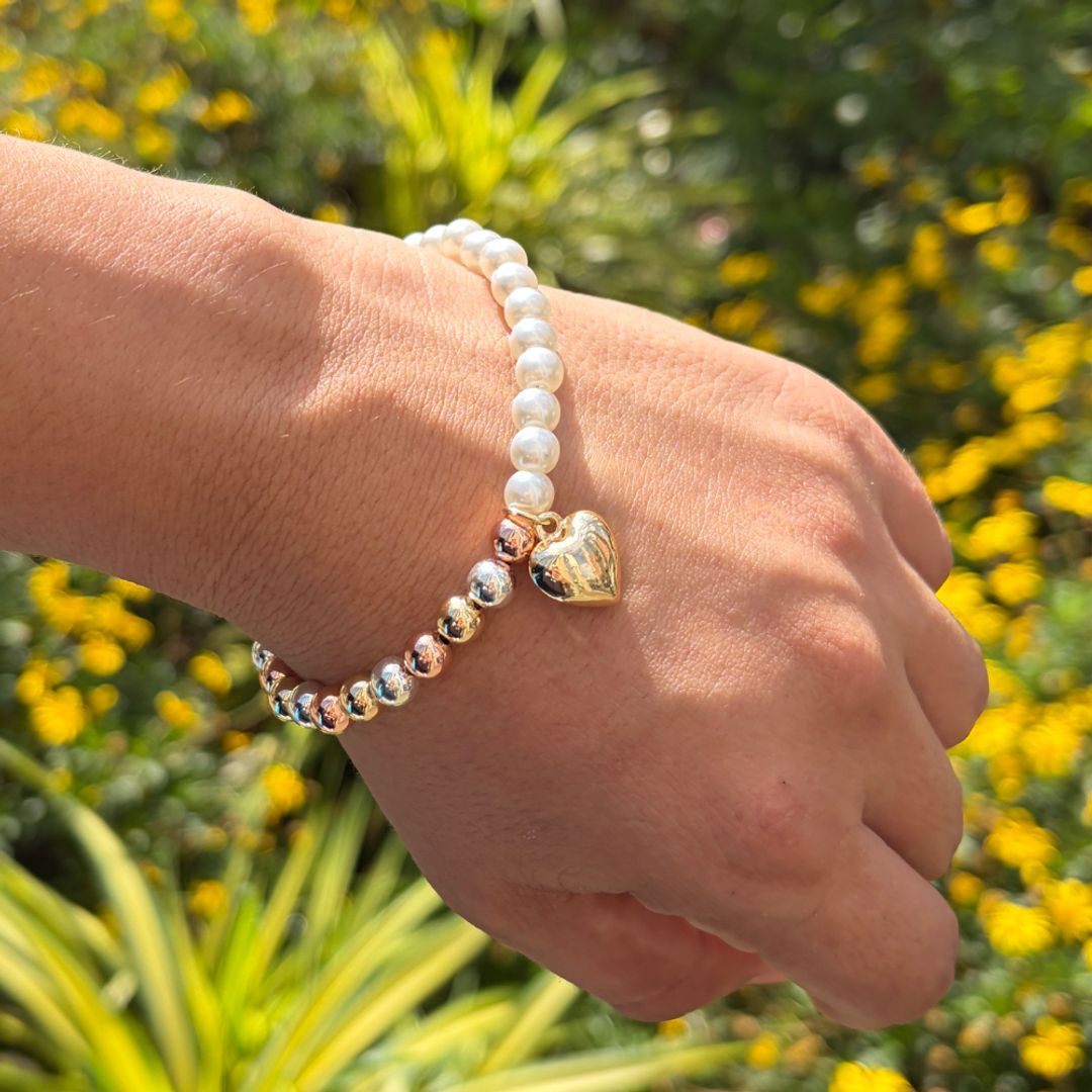 Pulsera perla corazón tricolor 