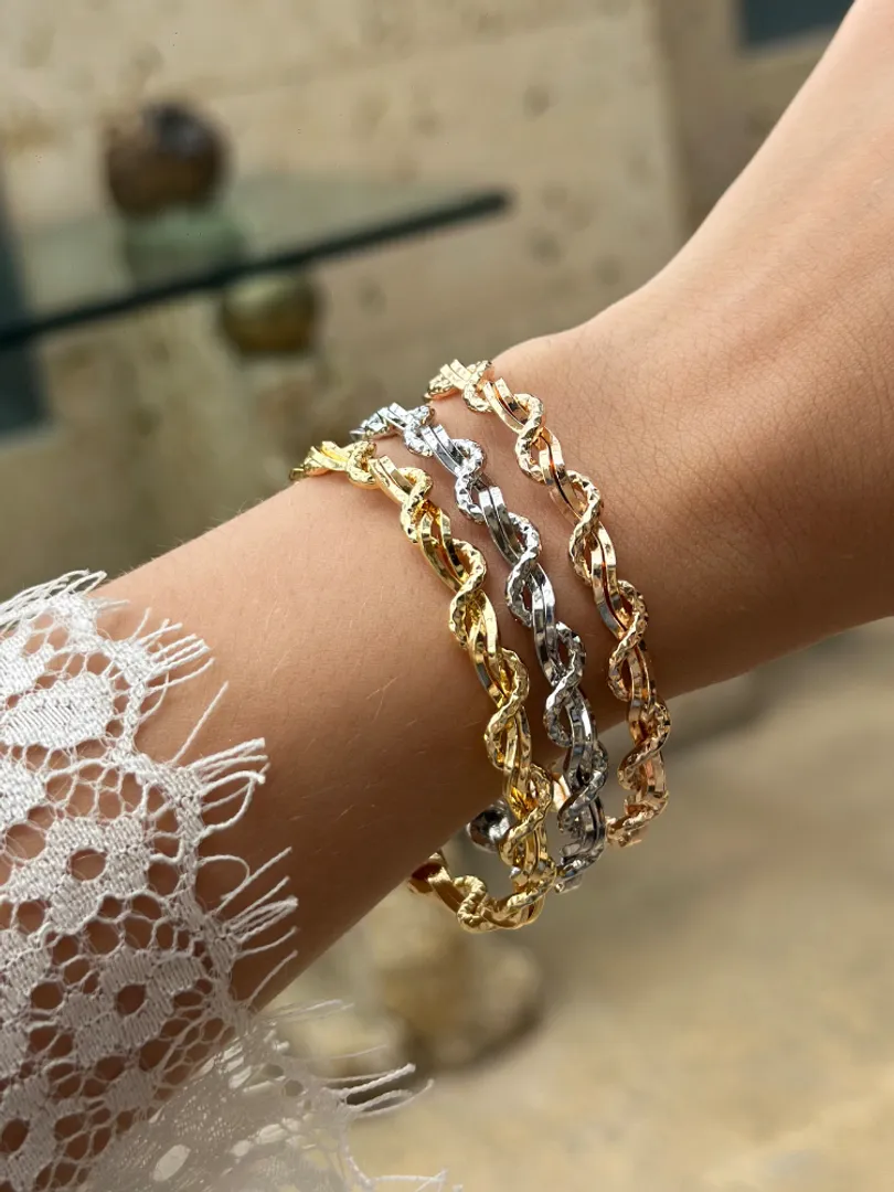 Pulsera tres oros trenzada 