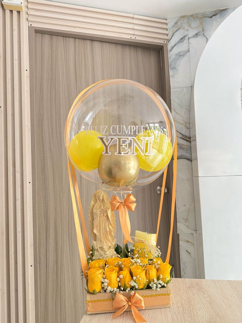 Caja con virgen y vela