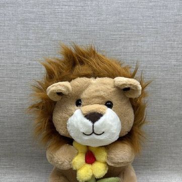 Imagen del producto LEON CON FLOR AMARILLA DE  40 CM 