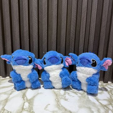 Imagen del producto MANILLA STICH Y ANGELA PELUCHE LUZ SONIDO Y MUEVE LA COLITA
