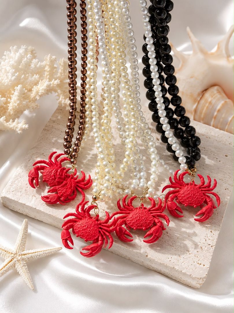 Collar de Perlas y Cangrejo