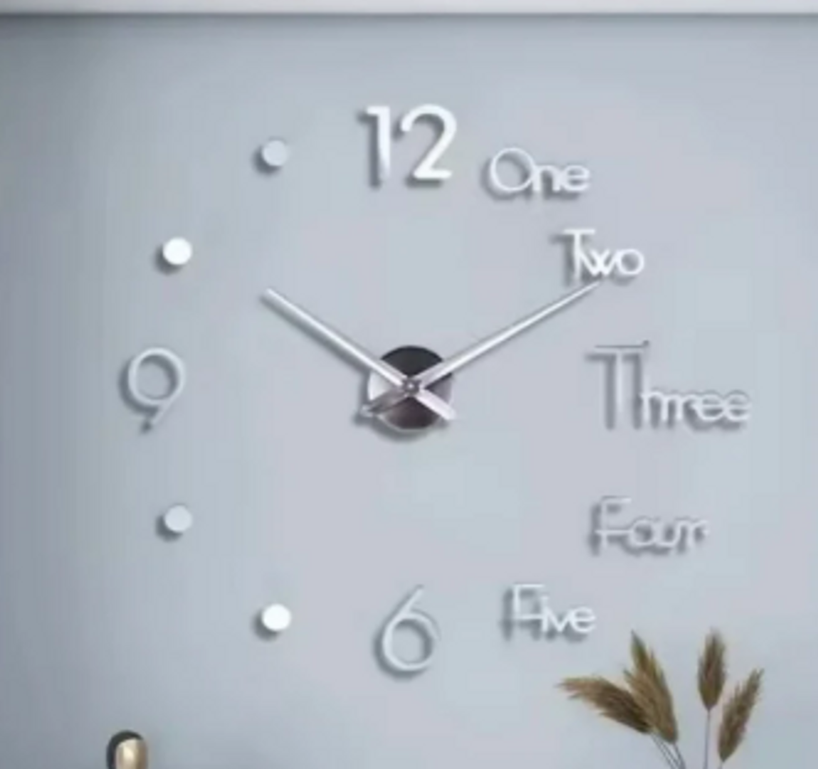 Reloj pared letras