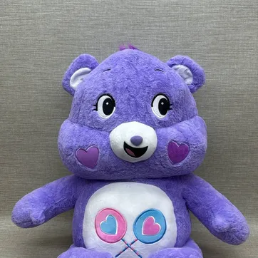 Imagen del producto OSO CARIÑOSO LILA DE 60 CM 