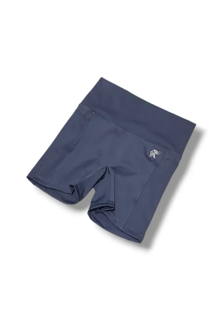Short Hybrid ajustado con bolsillos laterales y sin costura delantera tiro alto Lycra