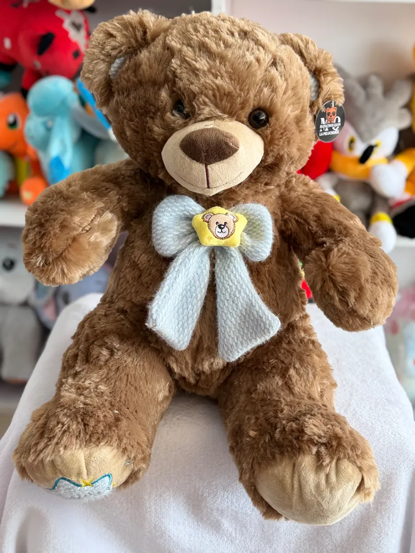 Oso patas corta moño azul 45cm 