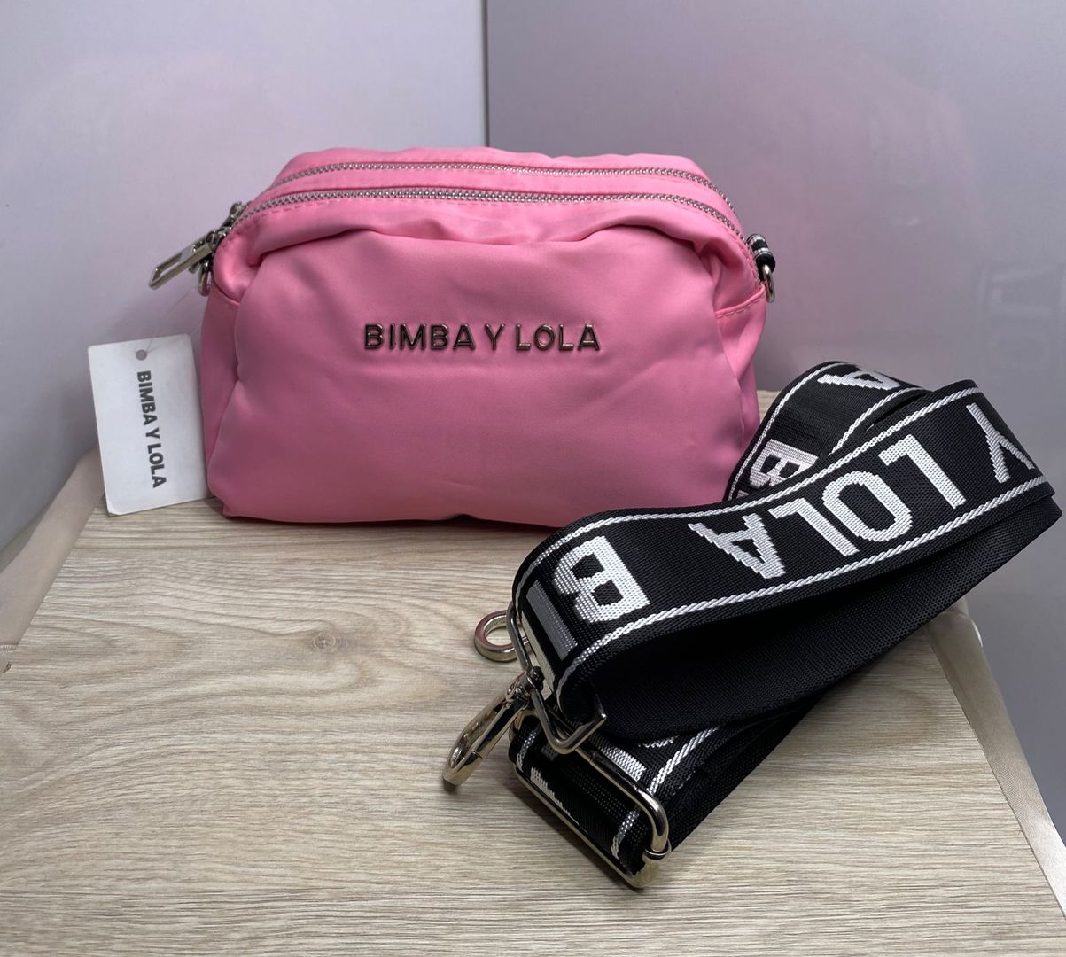 Bolso de lujo rosado y lila 