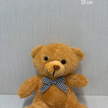 Imagen del producto OSO BEIGE OSCURO CON MOÑO 18 CM