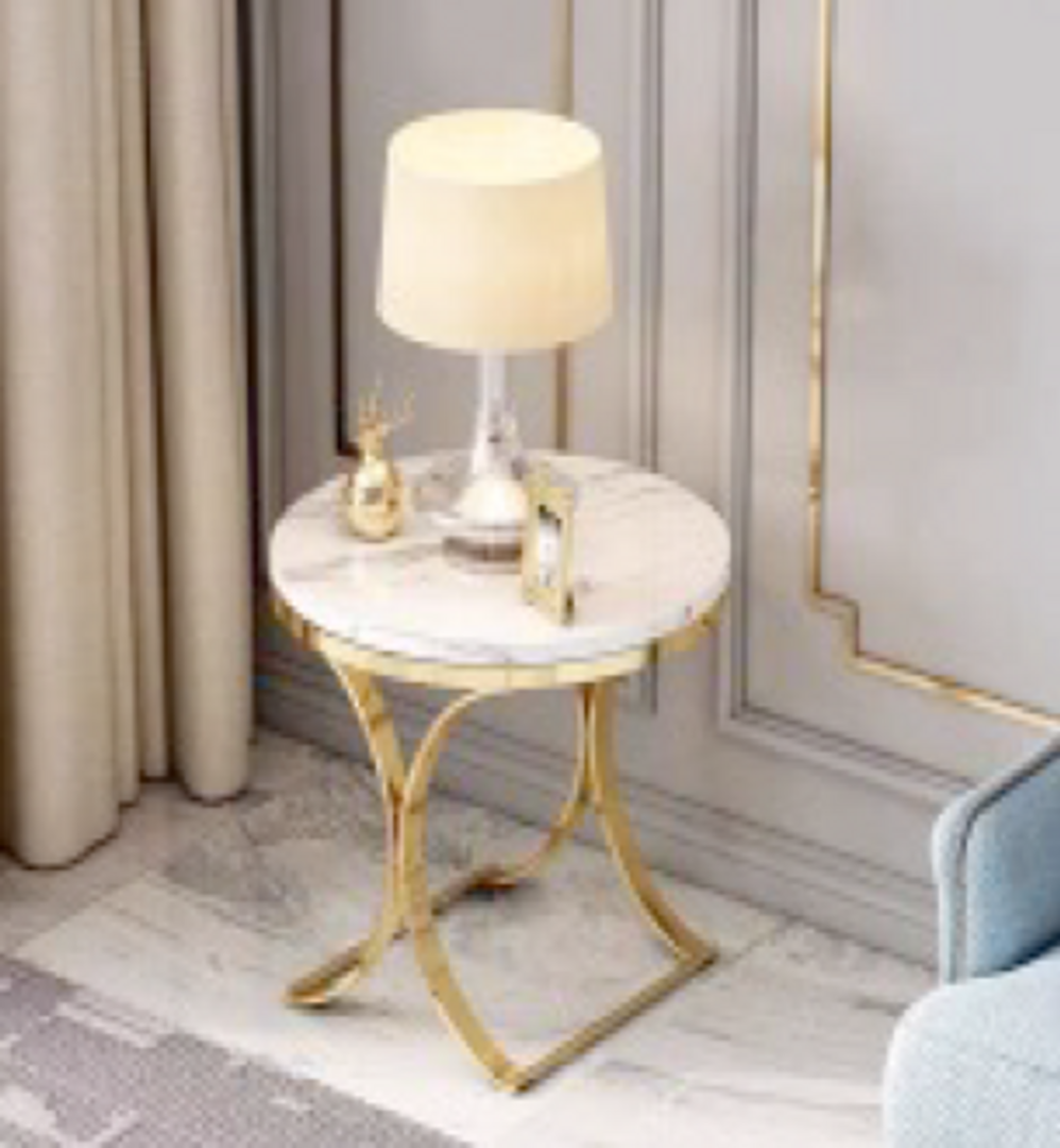Mesa dorada en acero y marmol