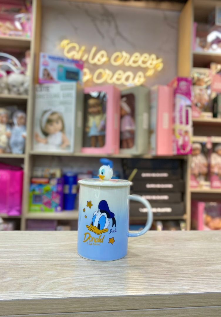 TAZA DONALD CON TAPA FIGURA