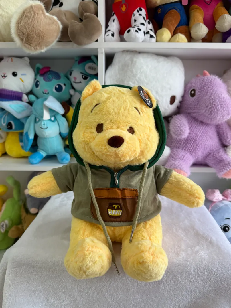 Whinnie de Pooh con suéter 35cm 