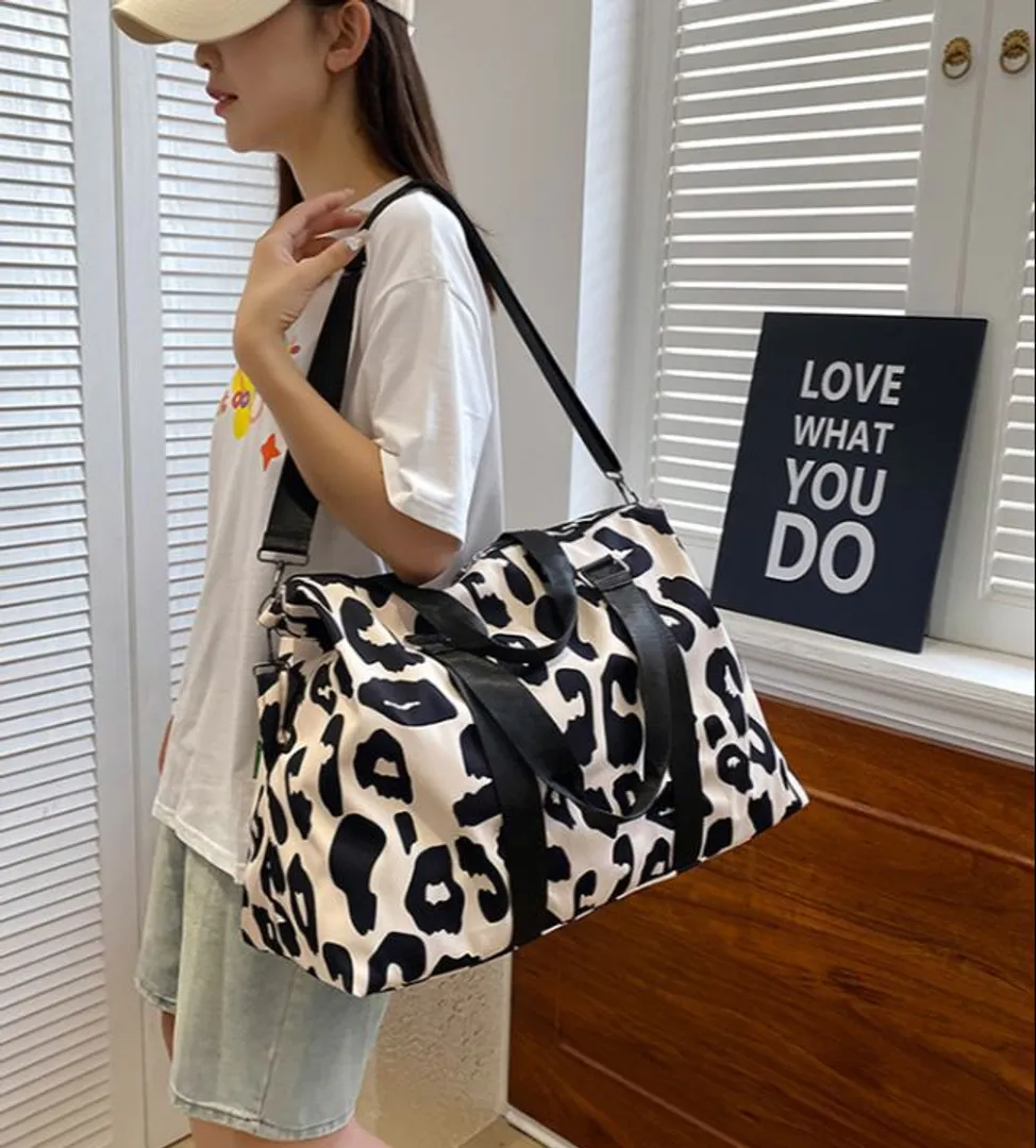 BOLSO VIAJERO ESTAMPADO 