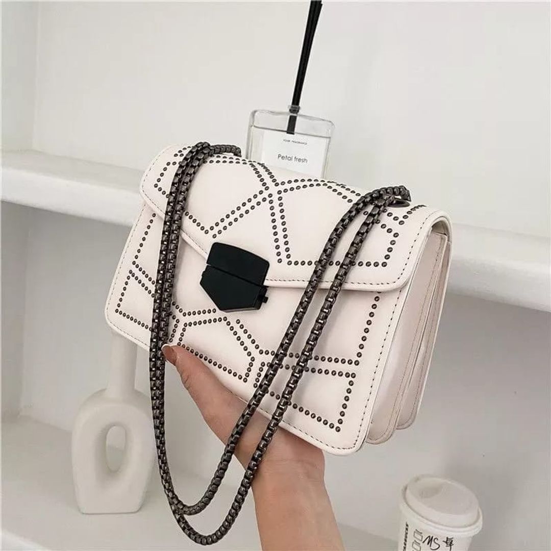 Bolso importado taches