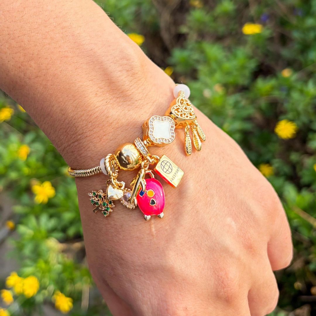 Pulsera travel charms Rosa