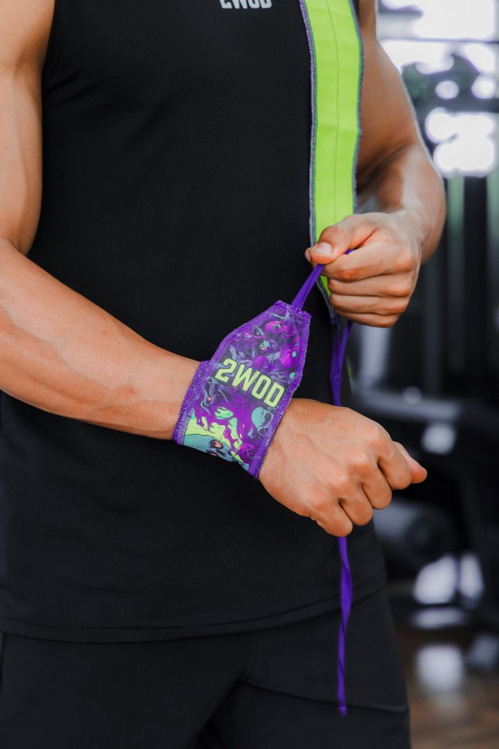 MUÑEQUERAS FIJAS SKULL MORADAS