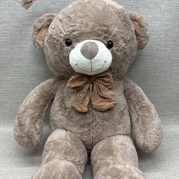 Imagen del producto OSO PATAS LARGAS CAFE CLARO CON BORDADO KISS ME 90 CM