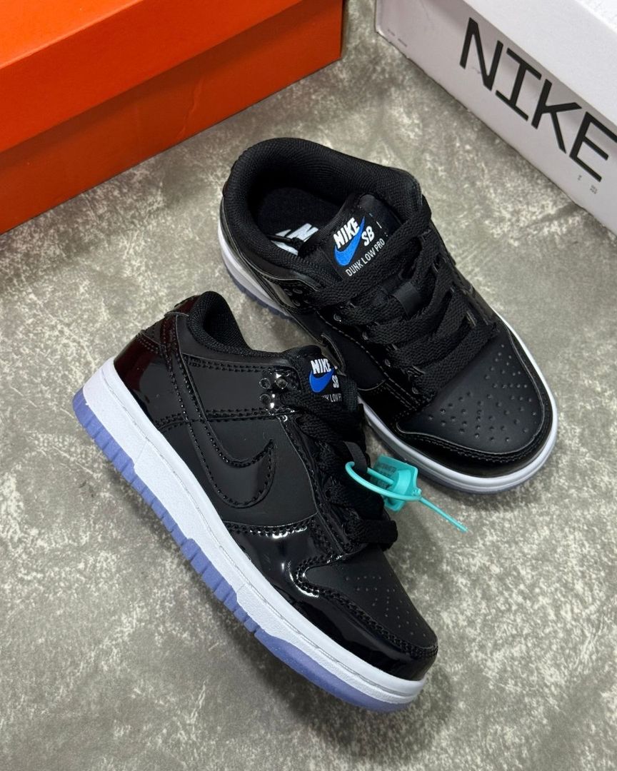 RETRO 1 LOW NEGRO AZUL CHAROL 1.1