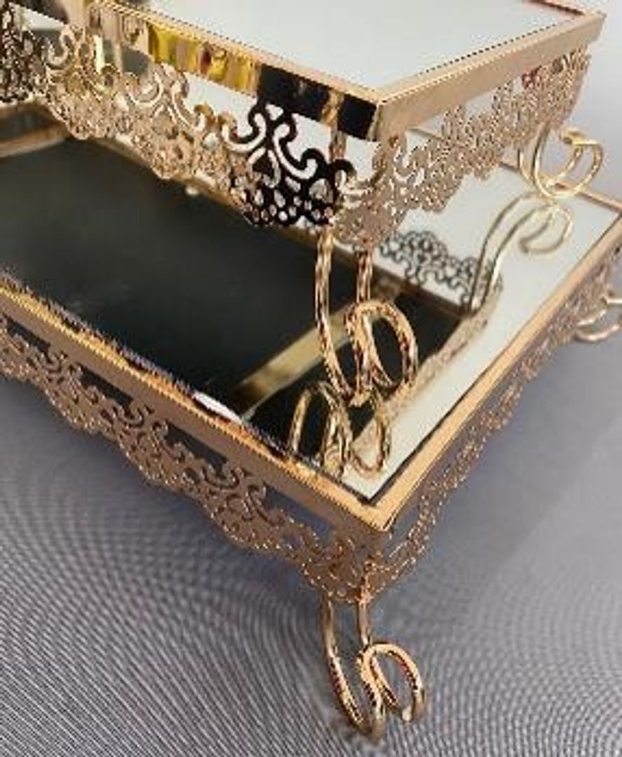 Set de dos bases en metal color dorado con espejo