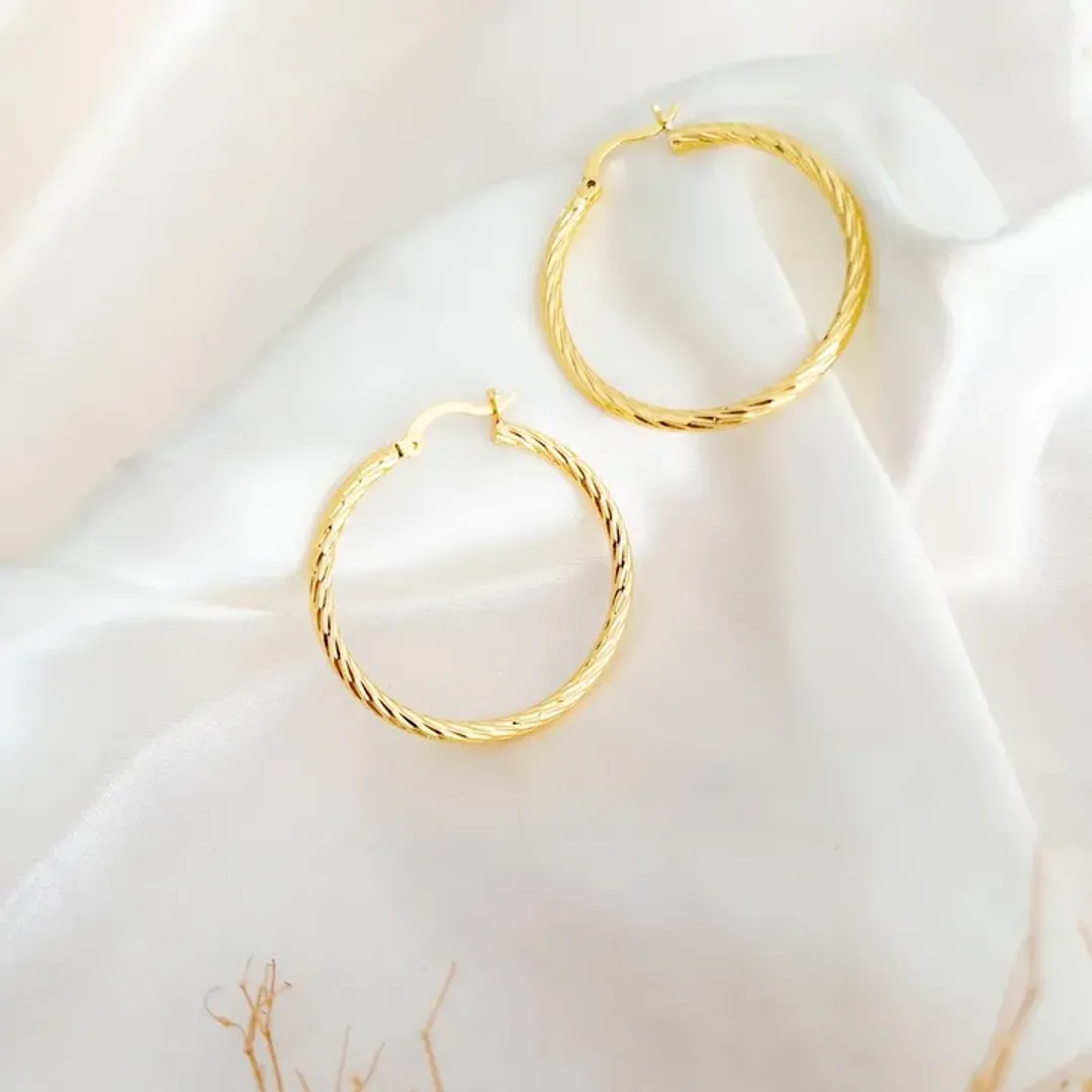 Pendientes en acero con baño de oro 24k