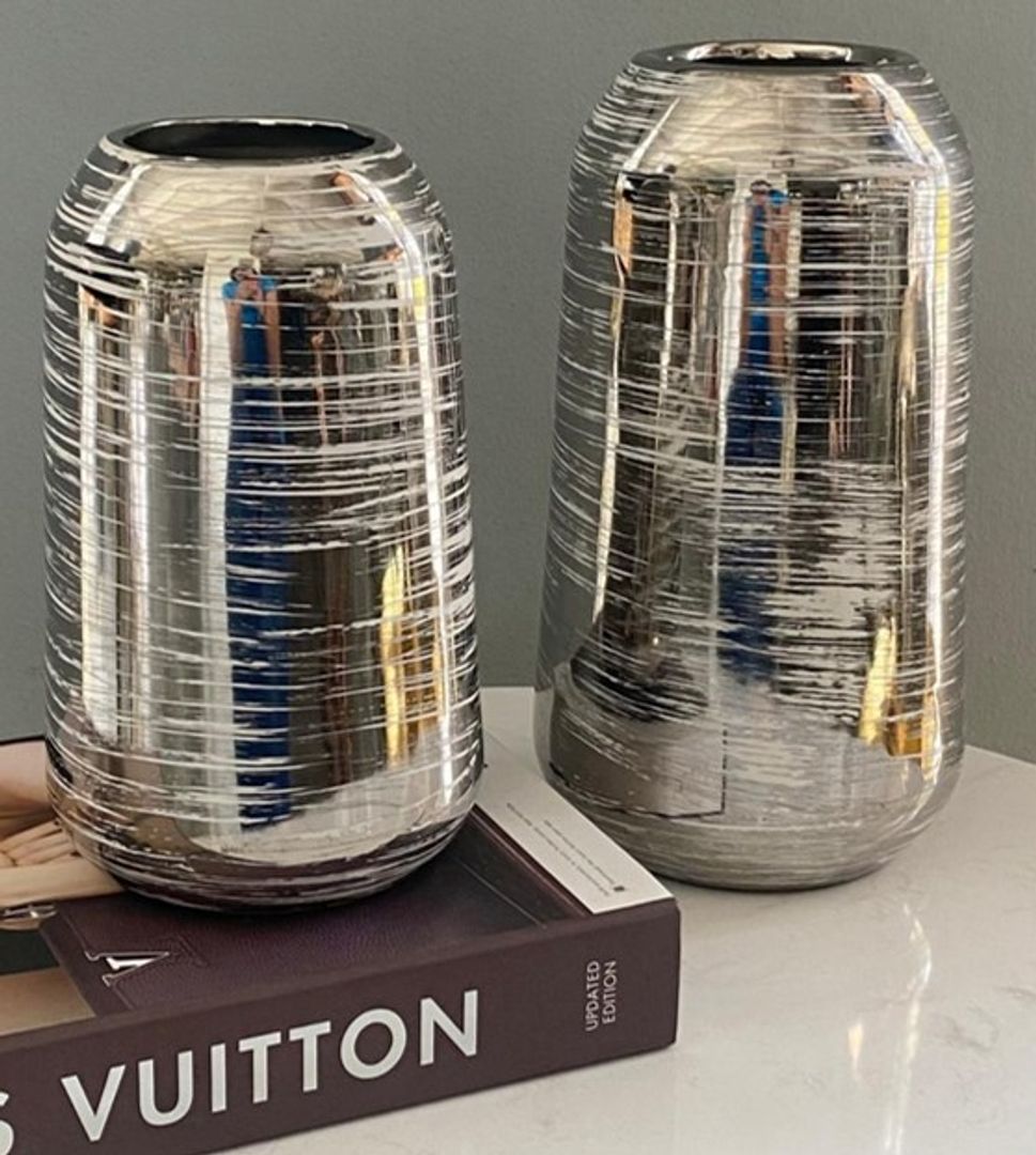 Floreros en cerámica plateados