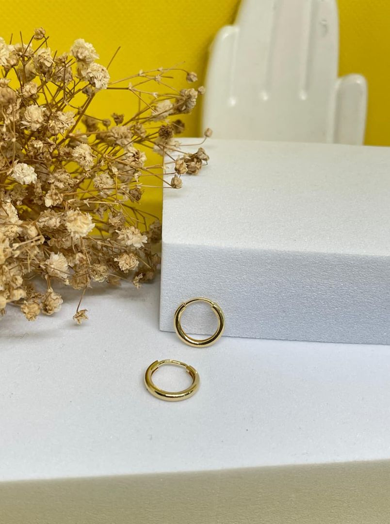 Candongas tipo piercing lisas redondas 1.1cm