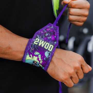 MUÑEQUERAS FIJAS SKULL MORADAS - imagen 1