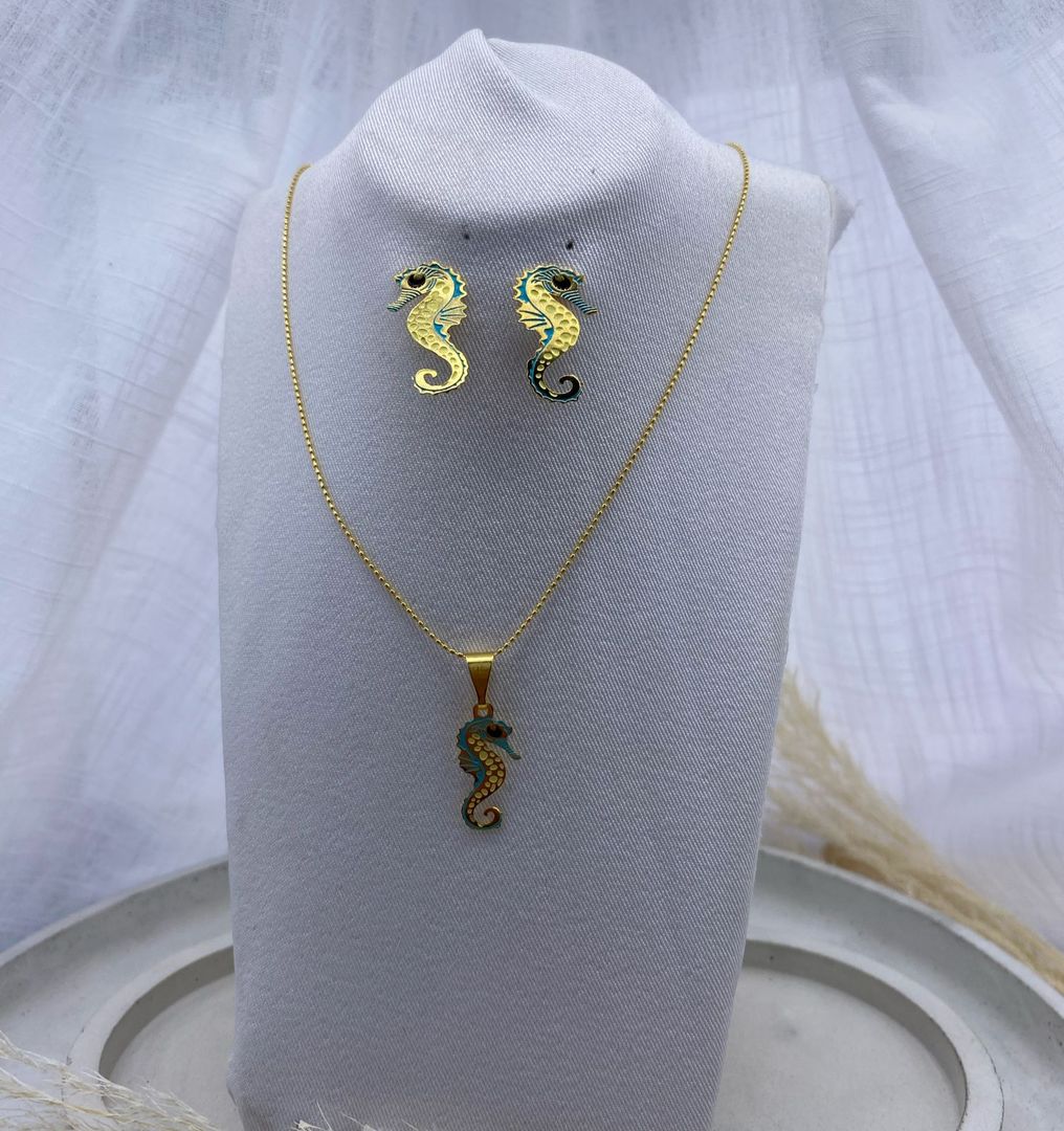 Juego en bronce con baño de oro, caballitos de mar 