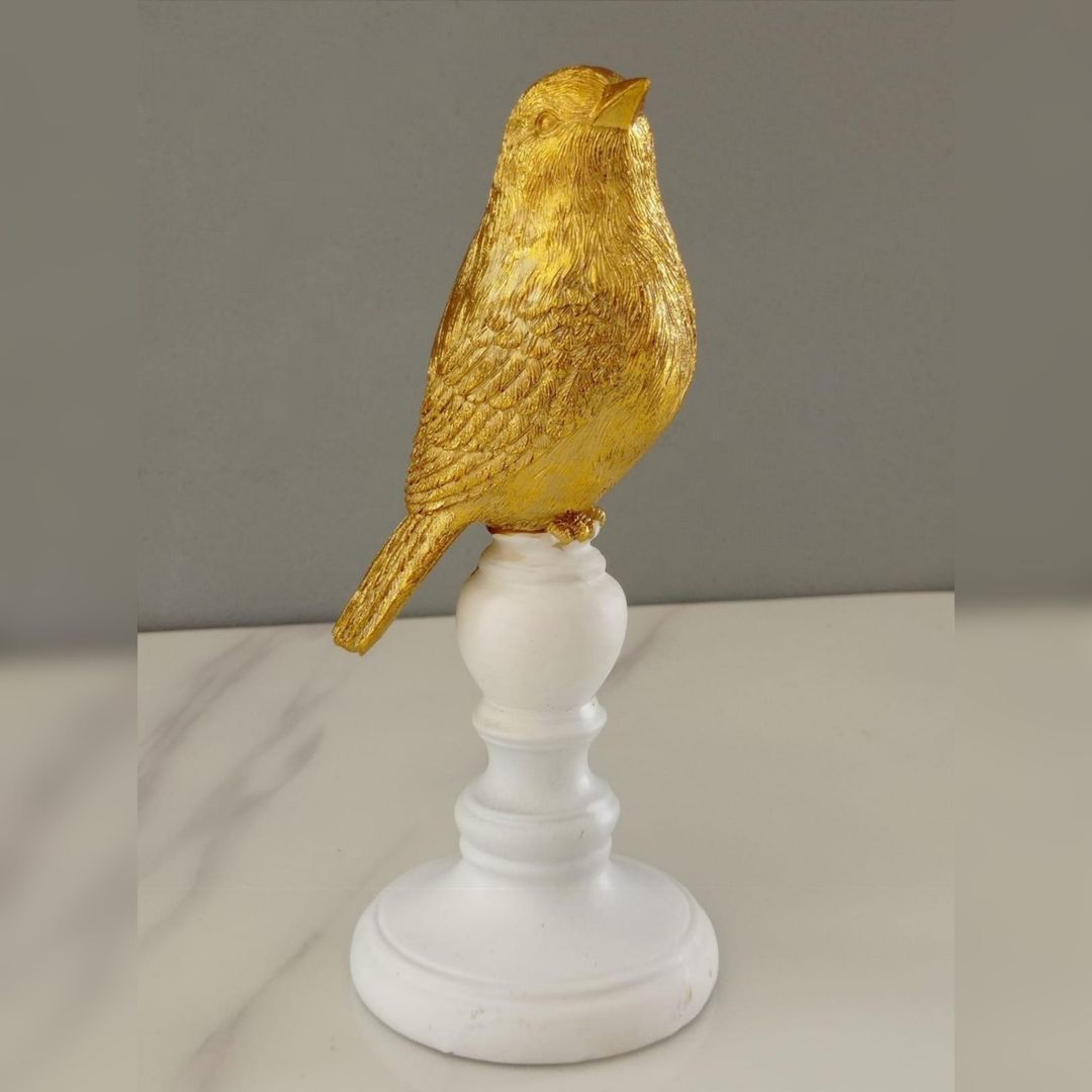 Figura de ave en resina dorado-blanco
