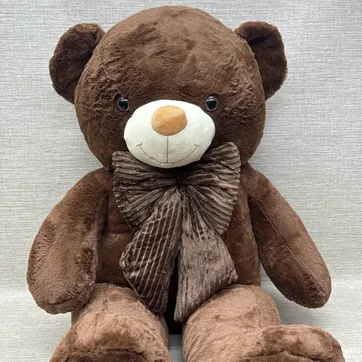 Imagen del producto OSO PATAS LARGAS CAFE OSCURO CON MOÑO 1, 20 CM