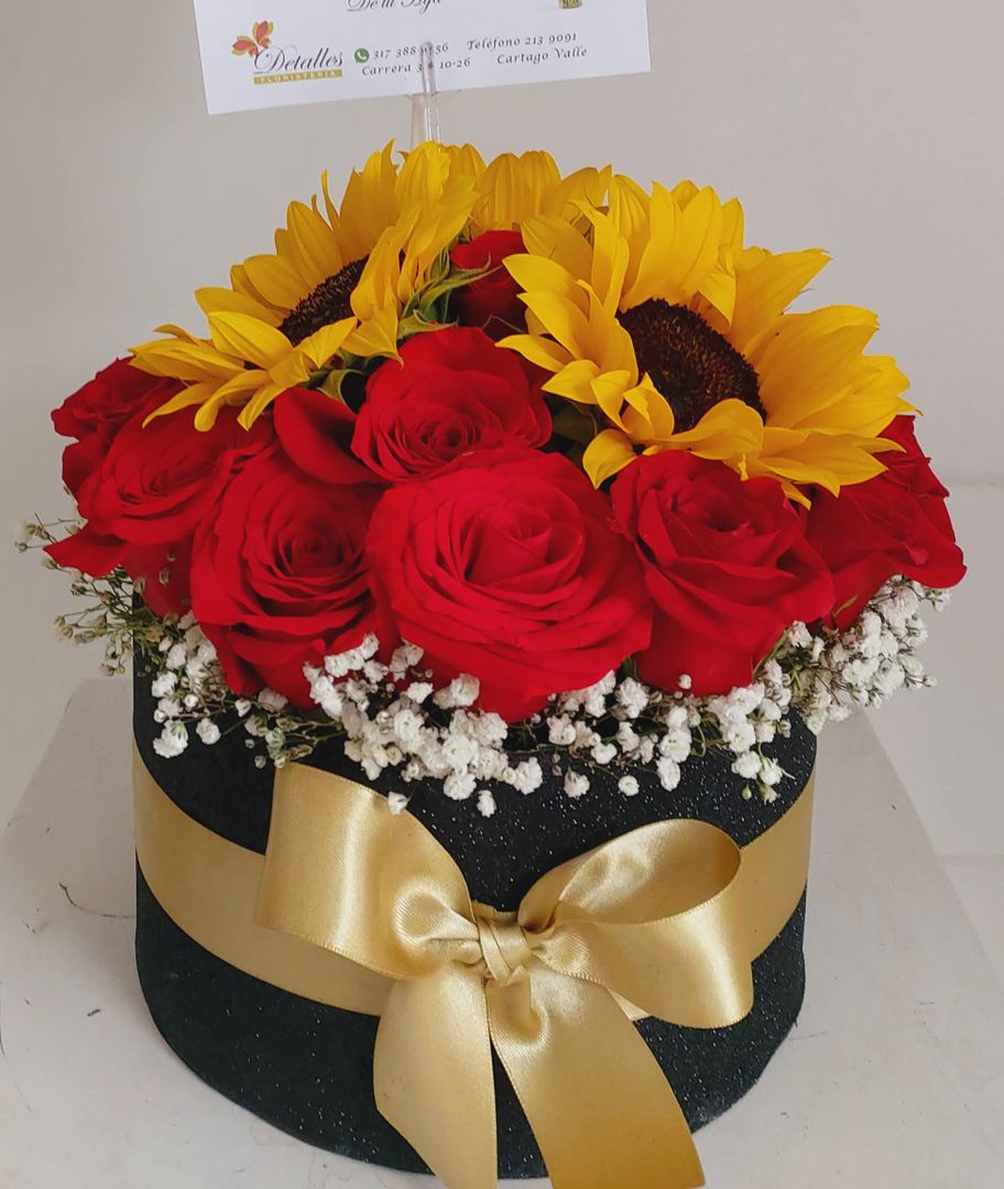 caja rosas y girasoles