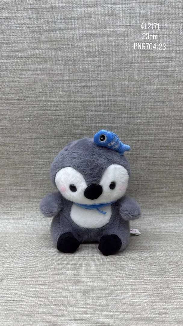 PINGUINO CON ACCESORIOS 23 CM