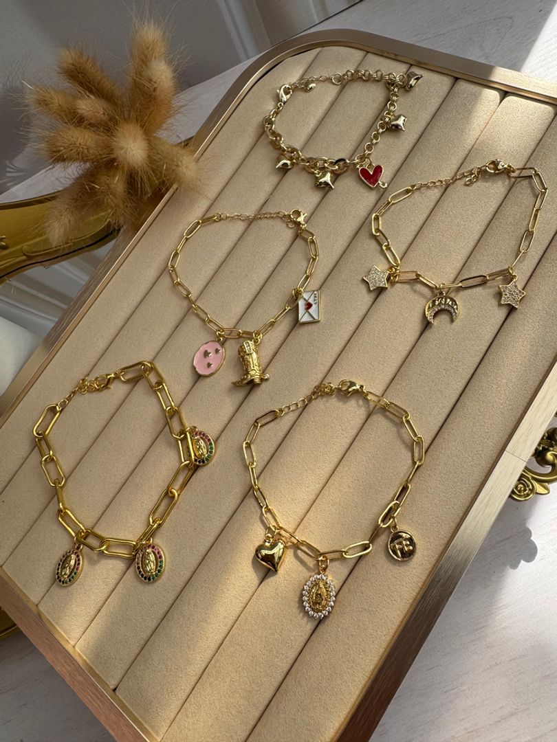 Pulseras en rodio con charms 