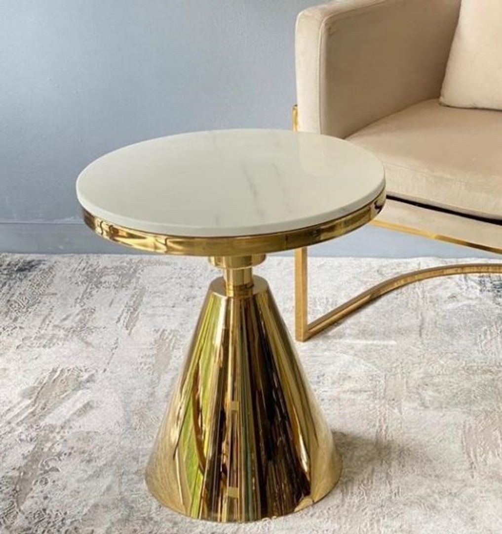 Mesa dorada en acero y marmol