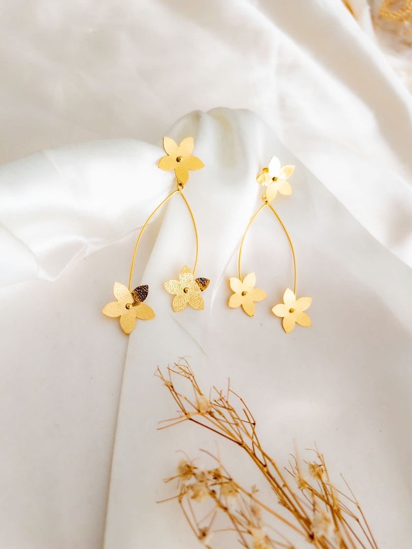 Arete tres flores