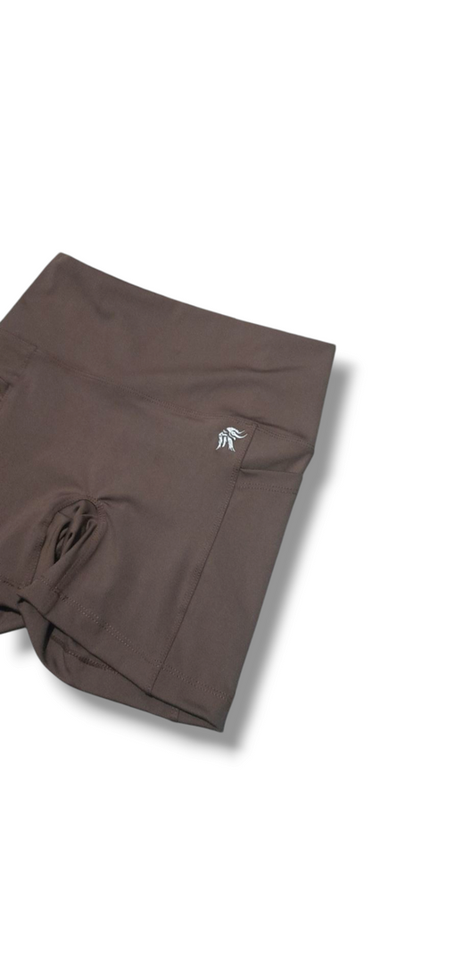Short Hybrid ajustado con bolsillos laterales y sin costura delantera tiro alto Lycra