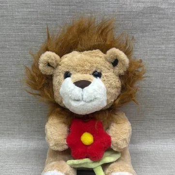 Imagen del producto LEÓN CON FLOR ROJA 30 CM