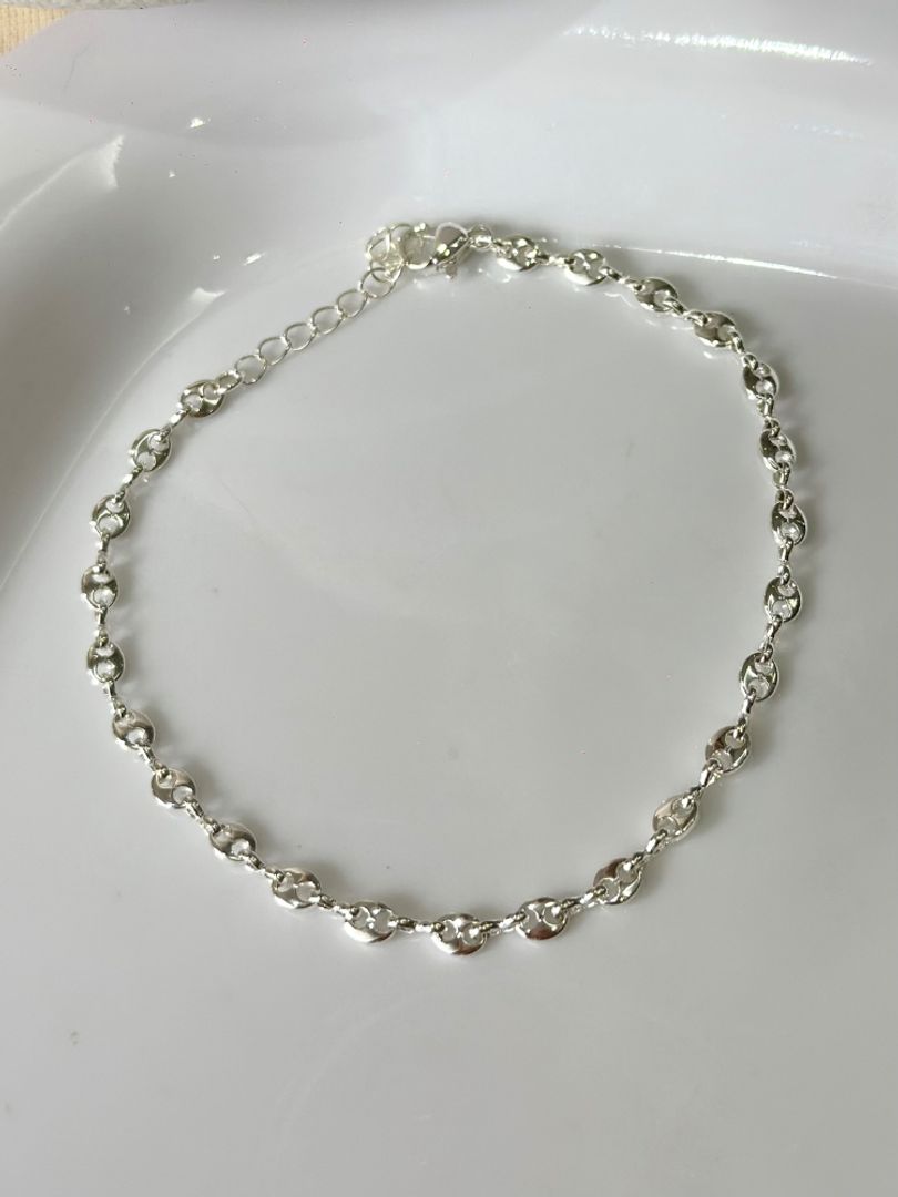 Tobillera Gucci plateada 