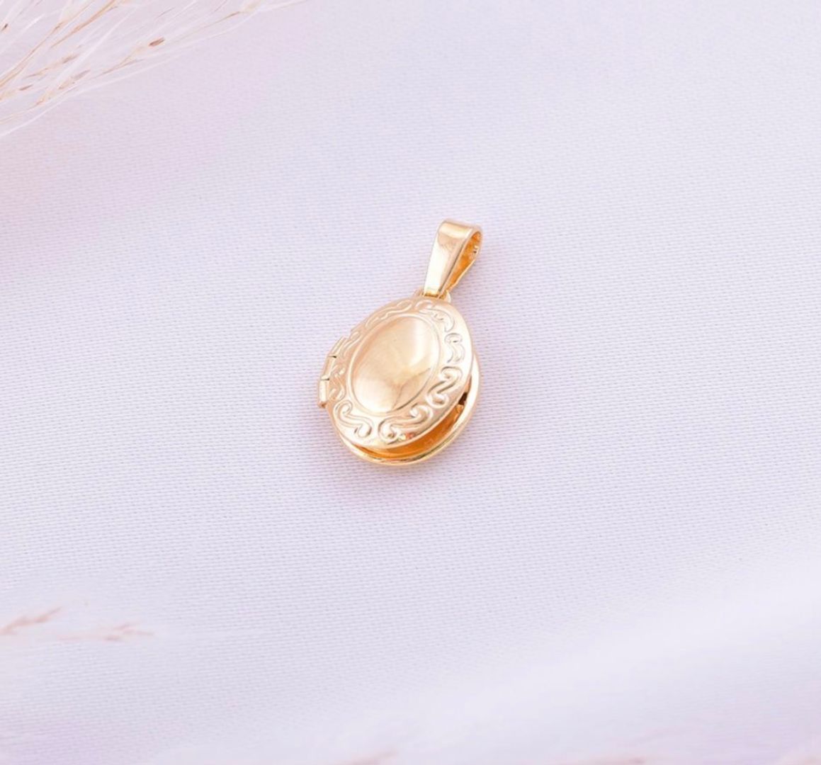 Dije relicario pequeño 