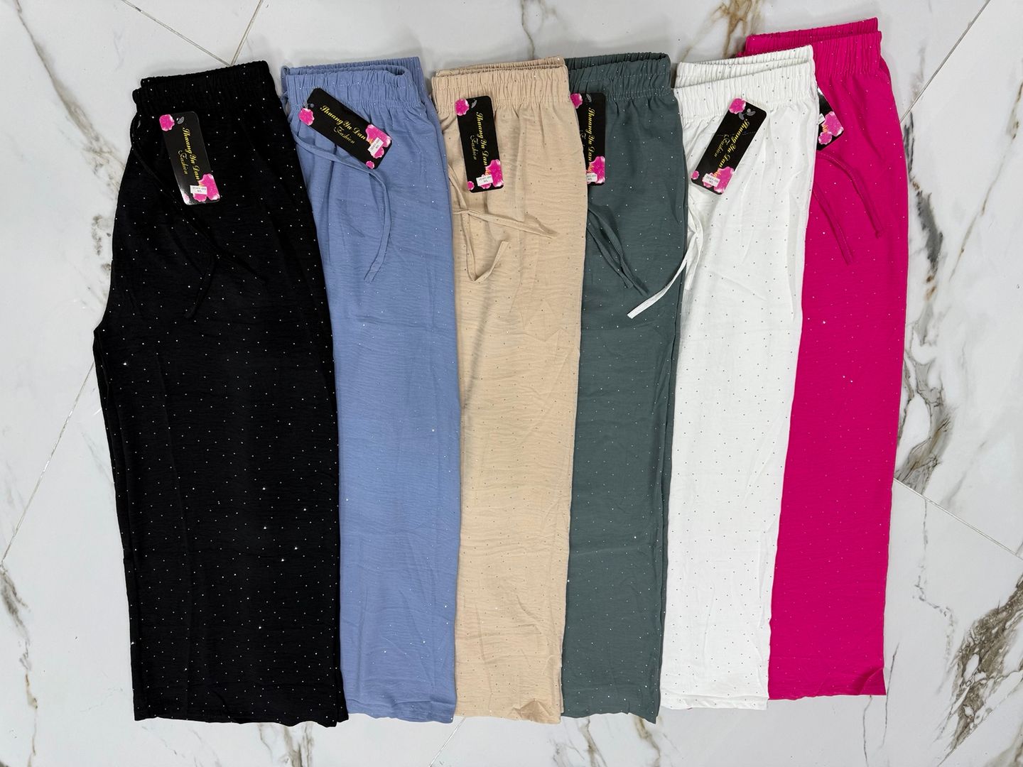 PANTALON CON BRILLOS TIPO PALAZO 