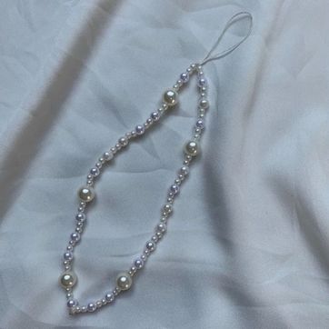 Imagen del producto PORTA CELULAR PERLAS 