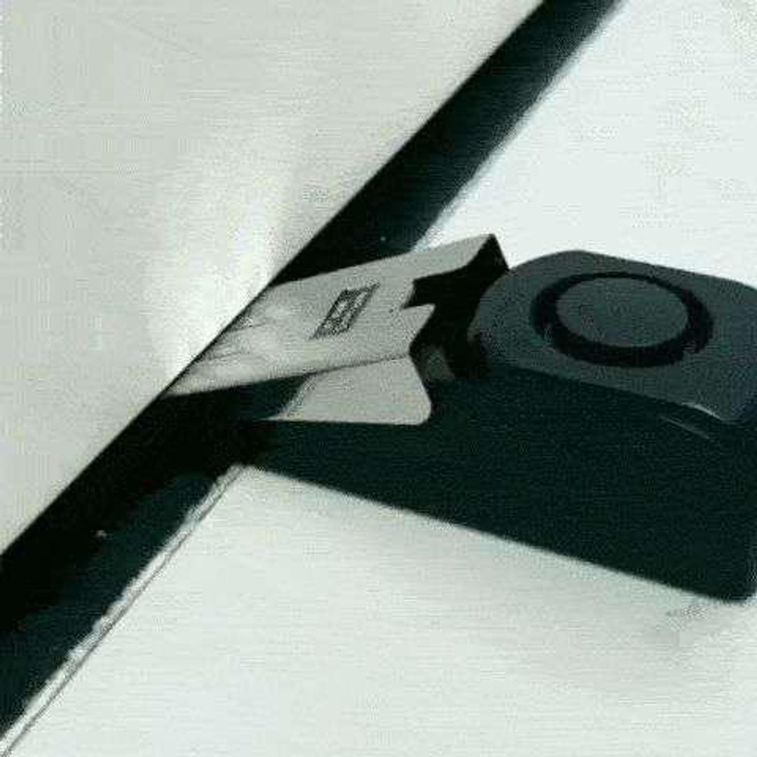 TOPE DE PUERTA CON ALARMA DE SEGURIDAD