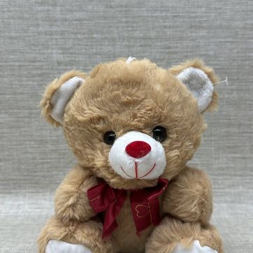 Imagen del producto Oso cafe claro con cinta roja de 20 cm 