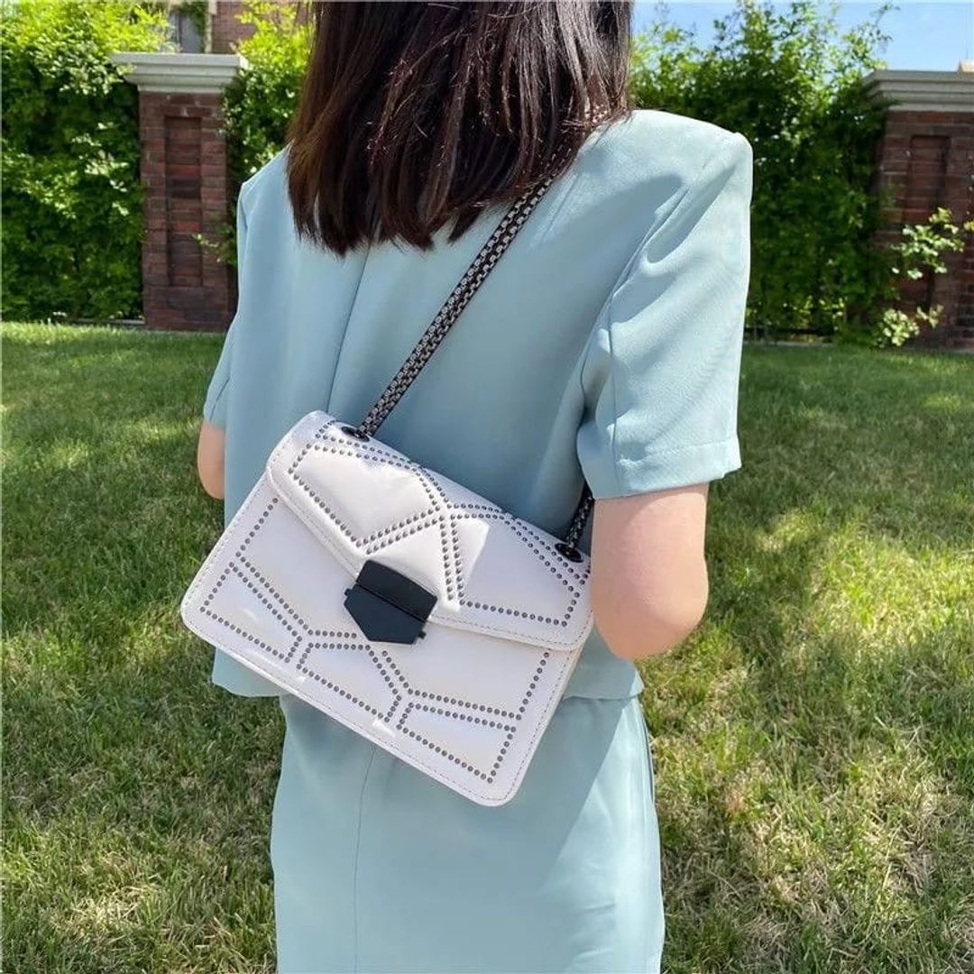 Bolso importado taches