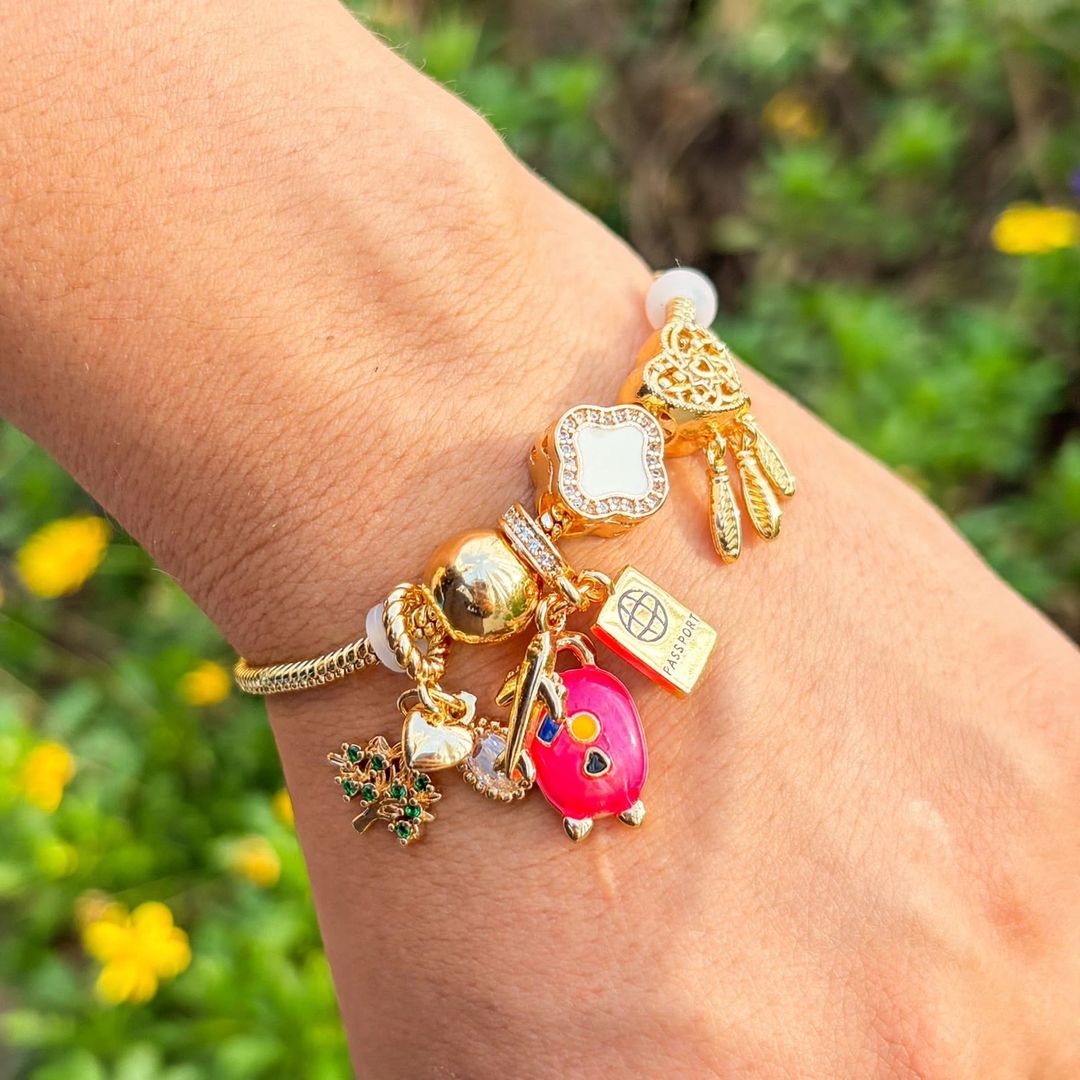 Pulsera travel charms Rosa