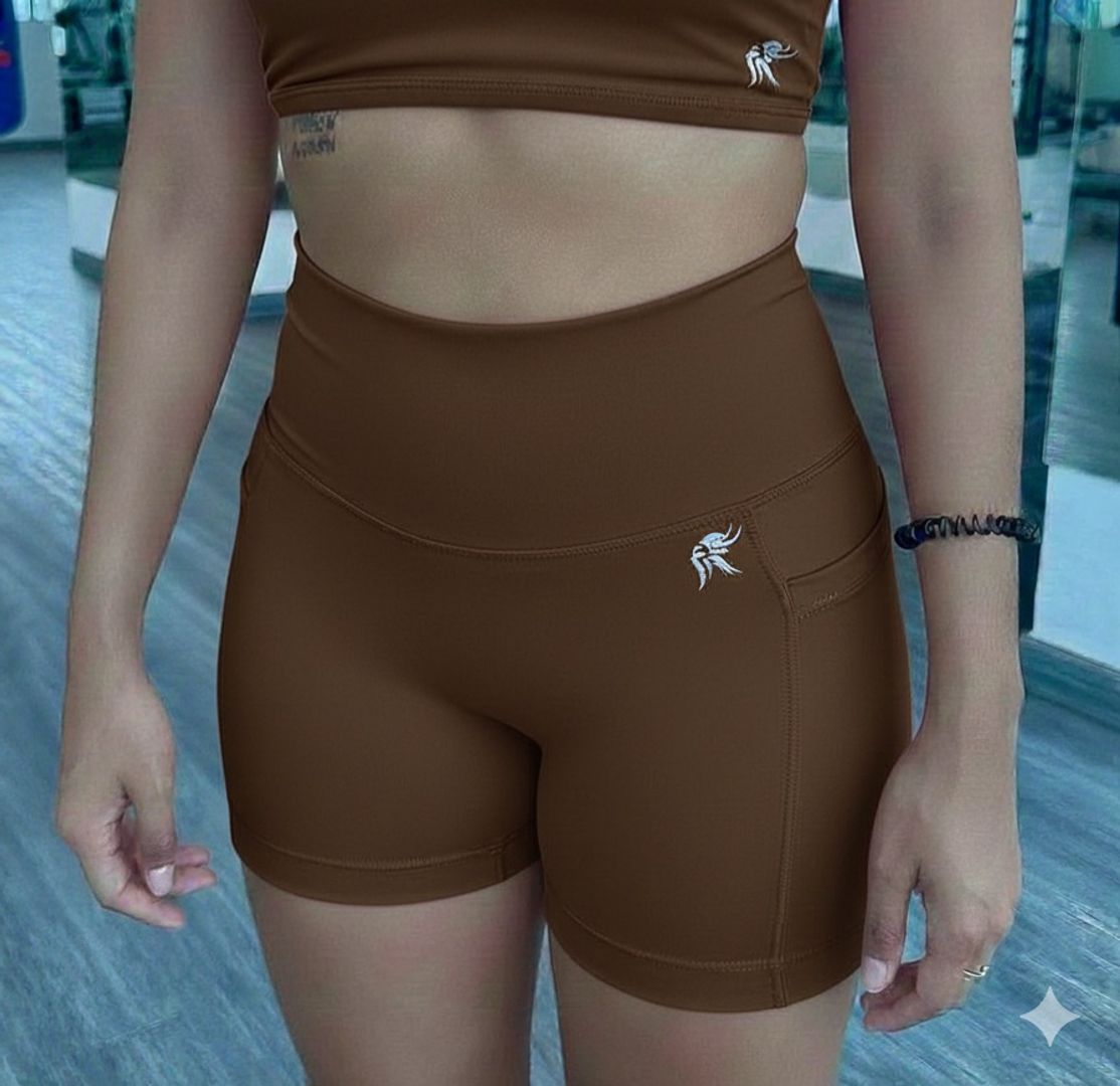  Short Hybrid ajustado con bolsillos laterales y sin costura delantera tiro alto Lycra