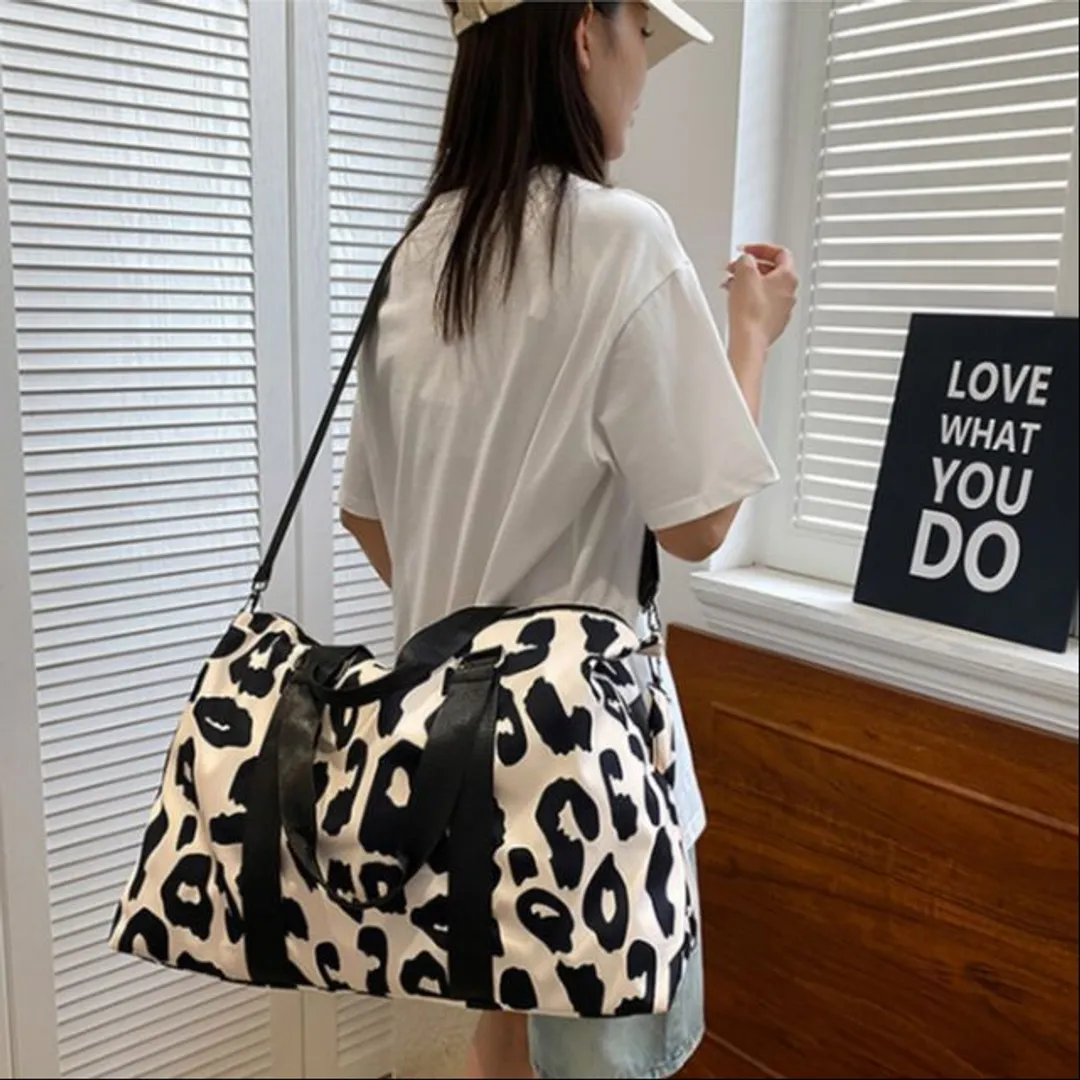 BOLSO VIAJERO ESTAMPADO 